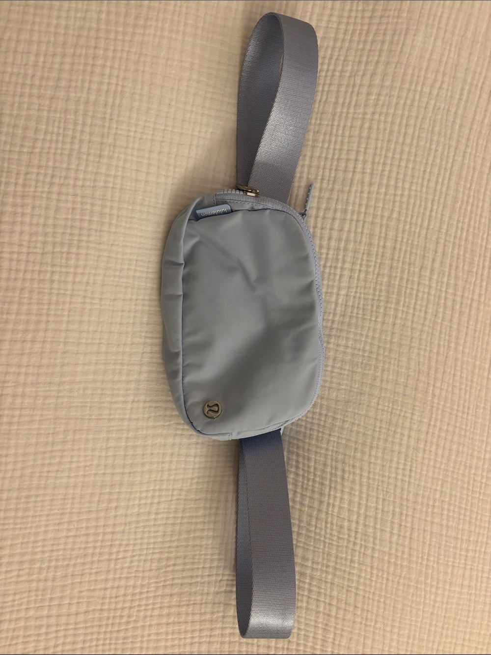 lululemon athletica light blue mini wristlet/waist bag